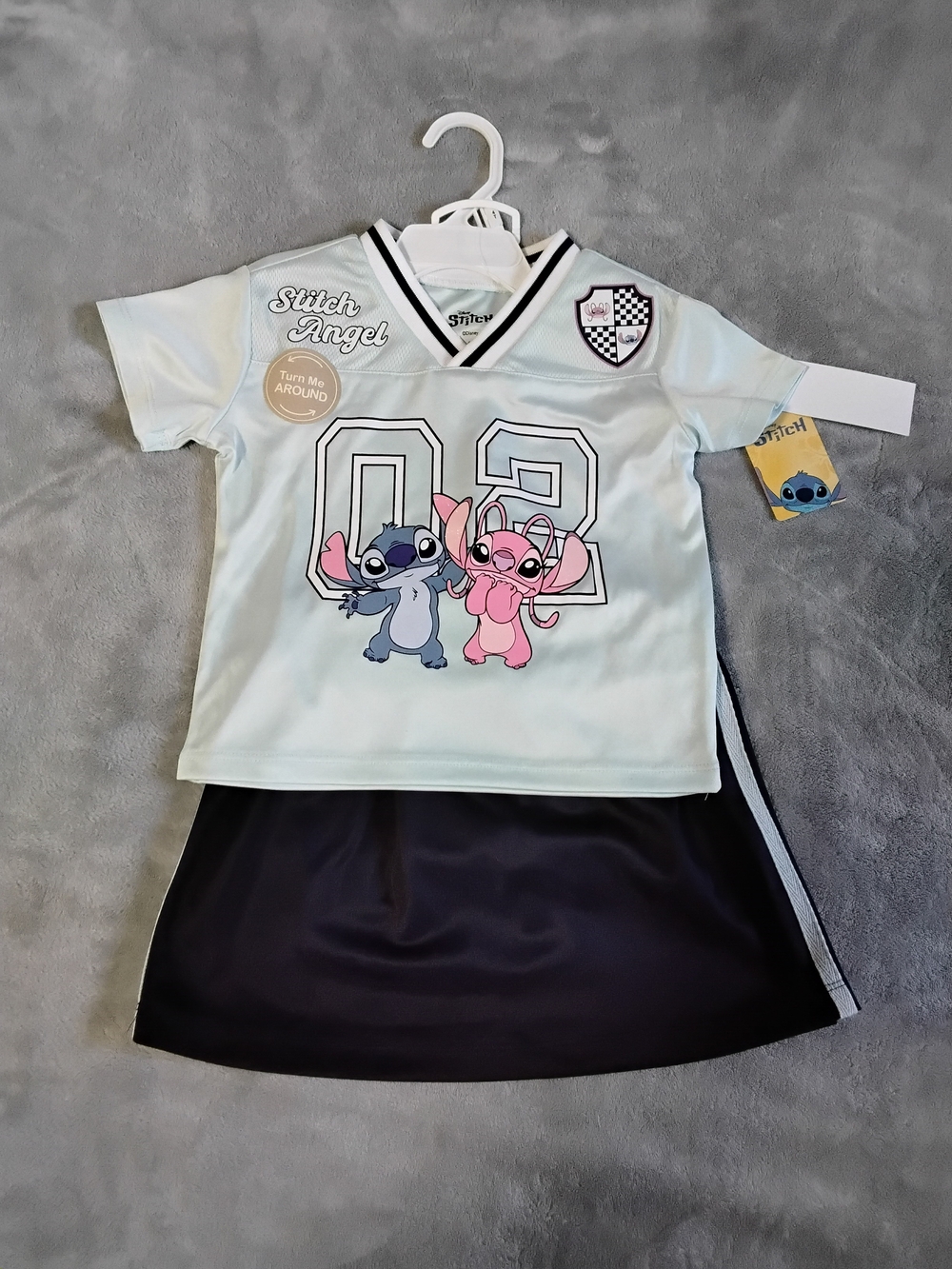 Disney Stitch & Angel Light Blue Jersey Top with Black Skirt